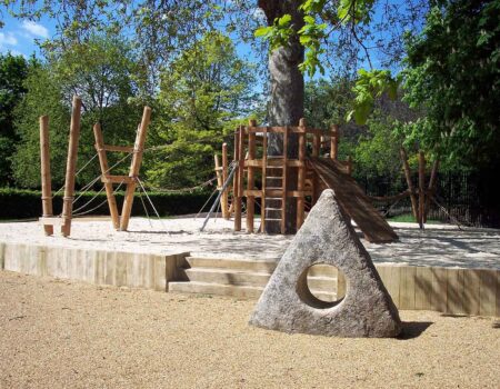 Holed stone as an alternative play element in a natural play area
