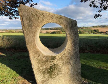 Large Cornish granite holed stone in a private garden