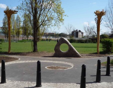 Wide holed stone creates visual impact at a park entrance