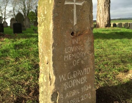 Headstone made from old weathered gatepost